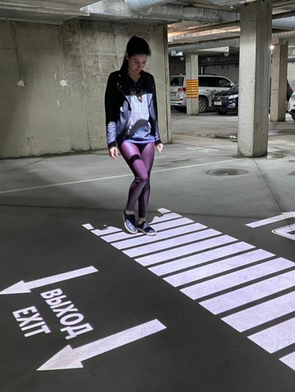 basement parking sidewalk projection for direction guide
